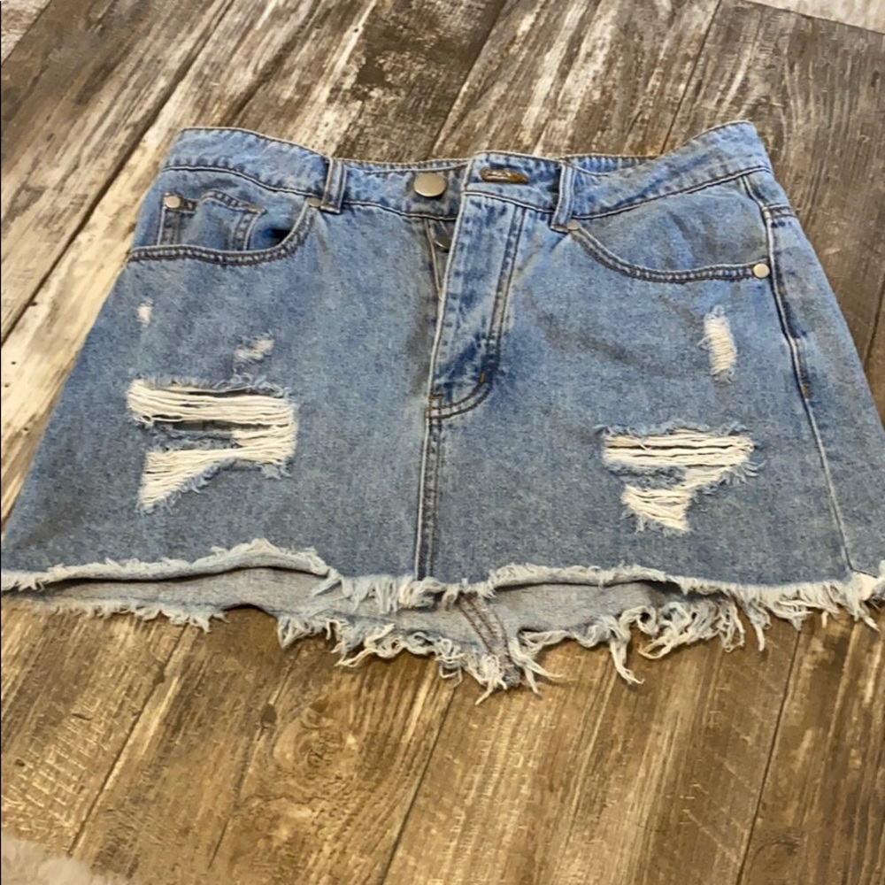 Distressed denim skirt